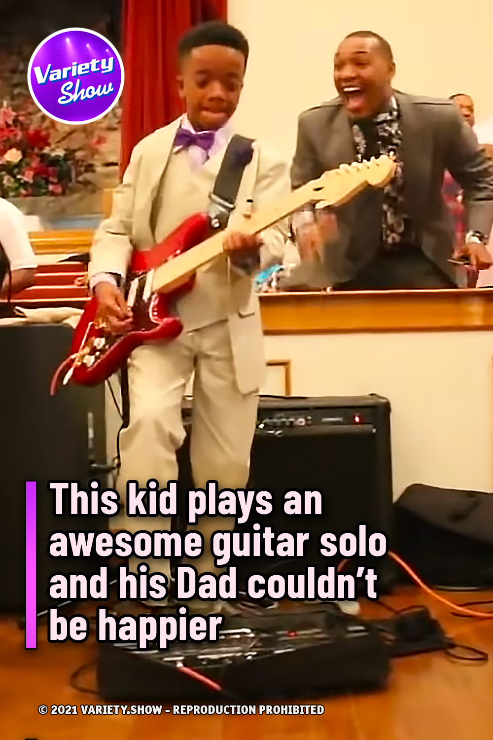 This kid plays an awesome guitar solo and his Dad couldn’t be happier